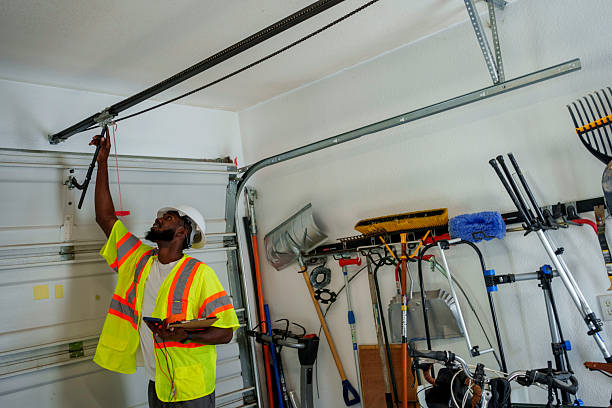 Professional Garage Door technician working in Tainter Lake, WI